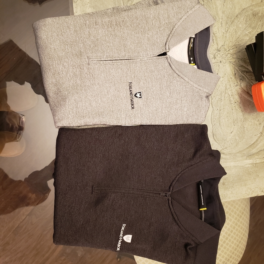 Two Oakley Golf Vests